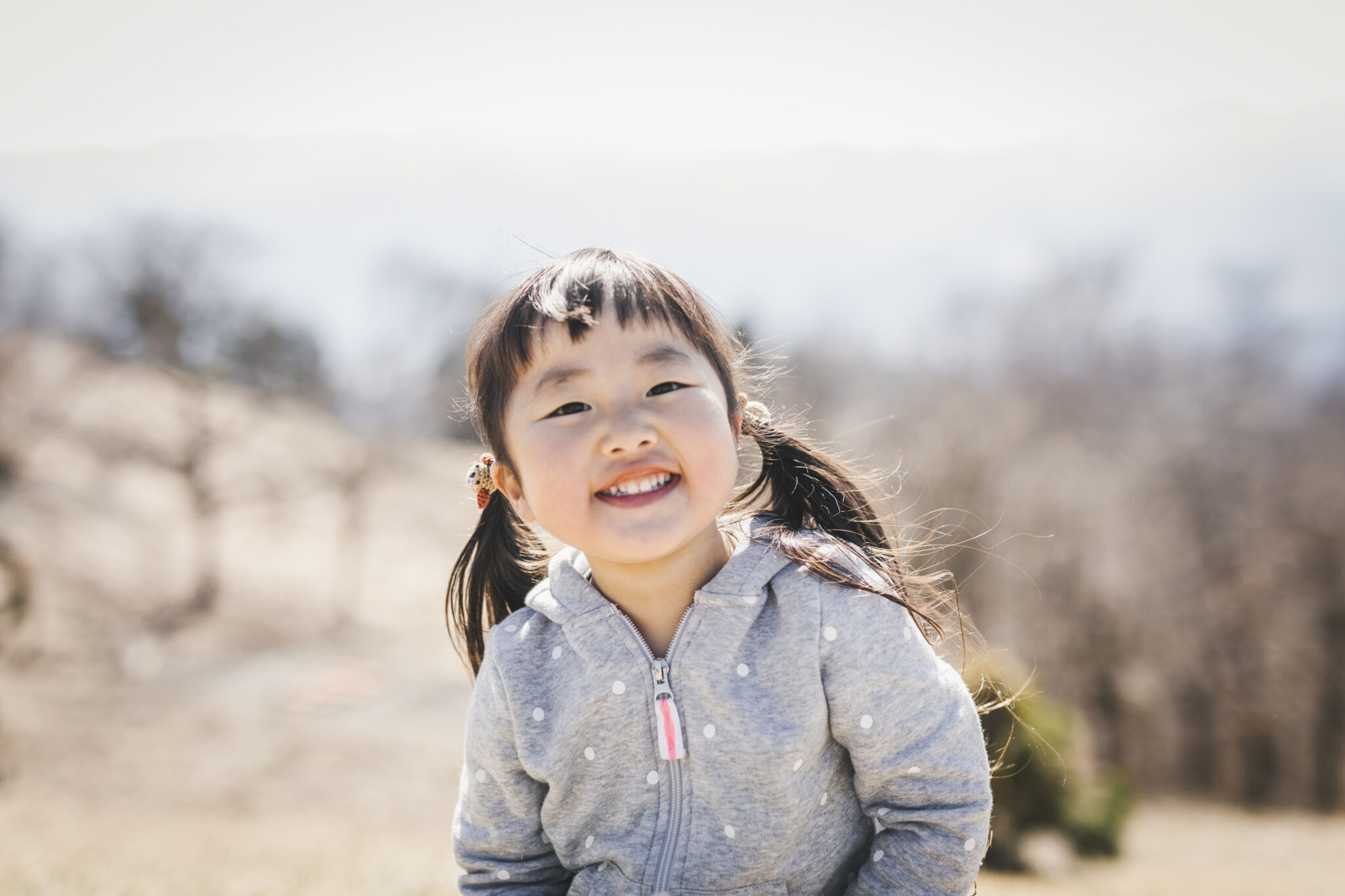 young asian girl smiling