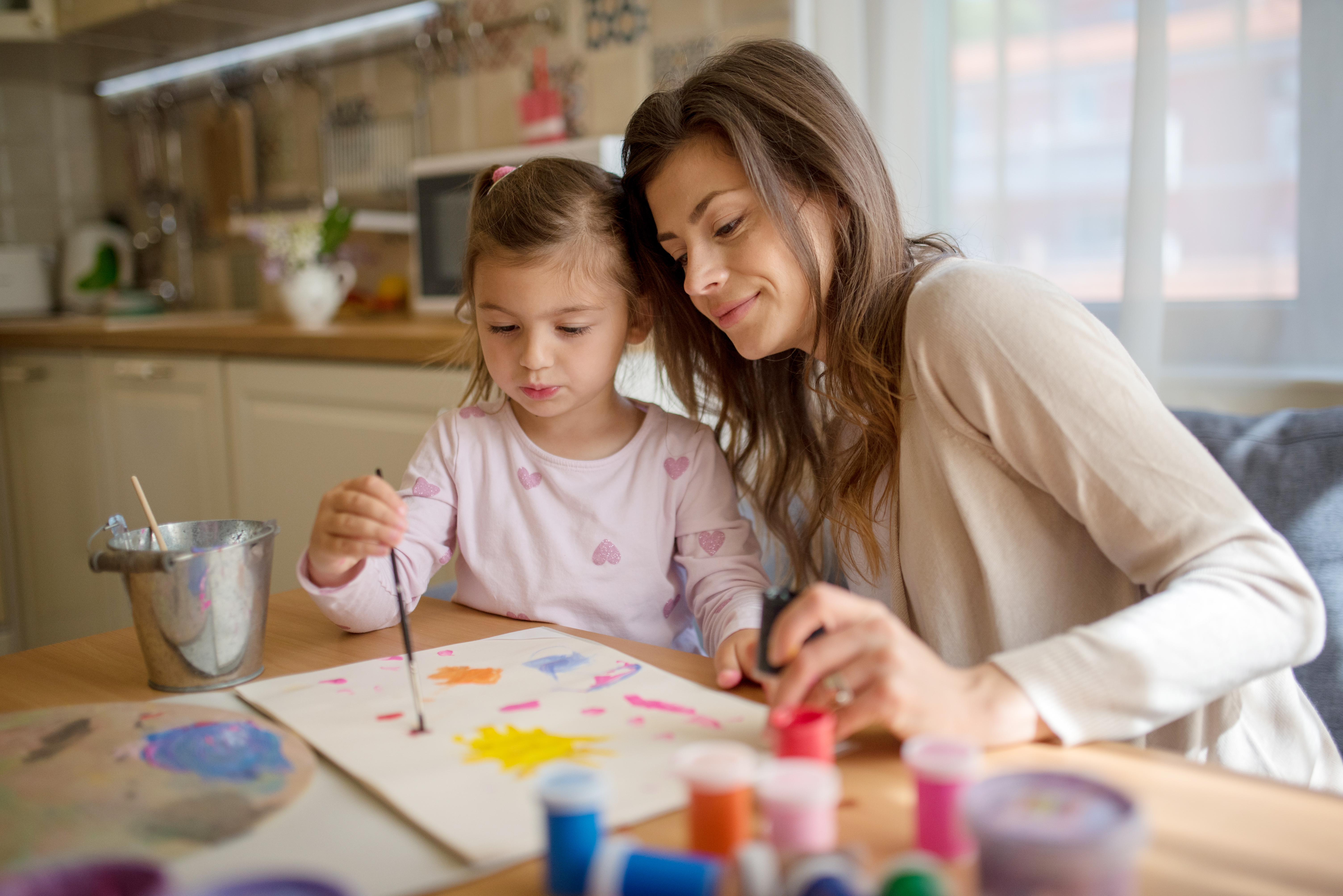 mom and daughter painting