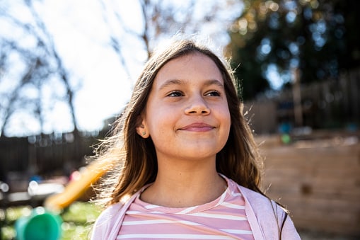 young girl smiling