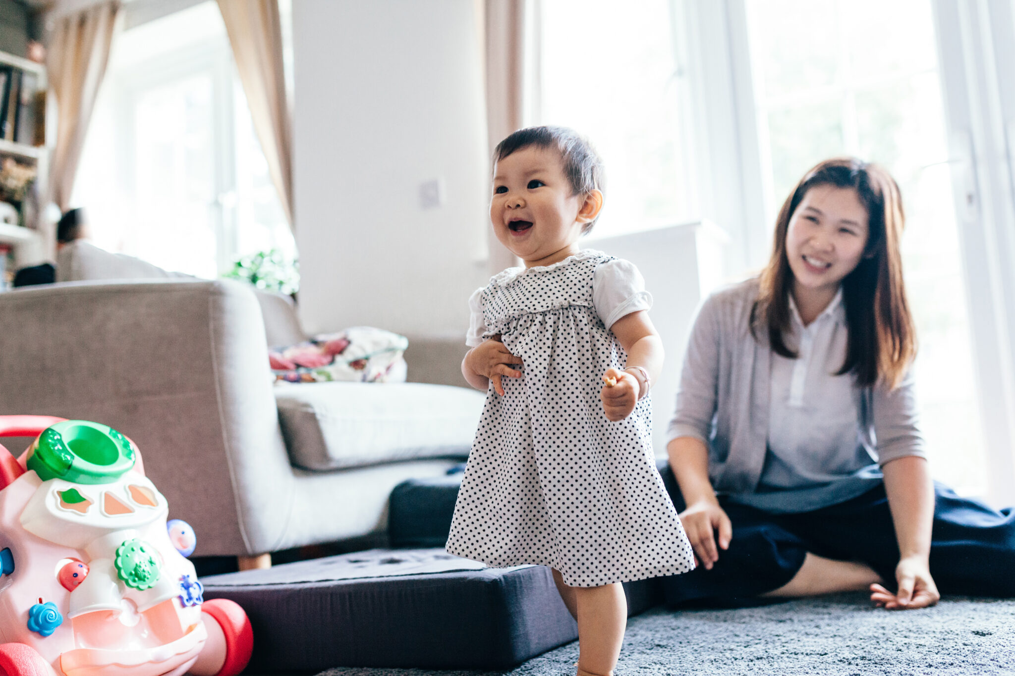 young asian baby learning to walk
