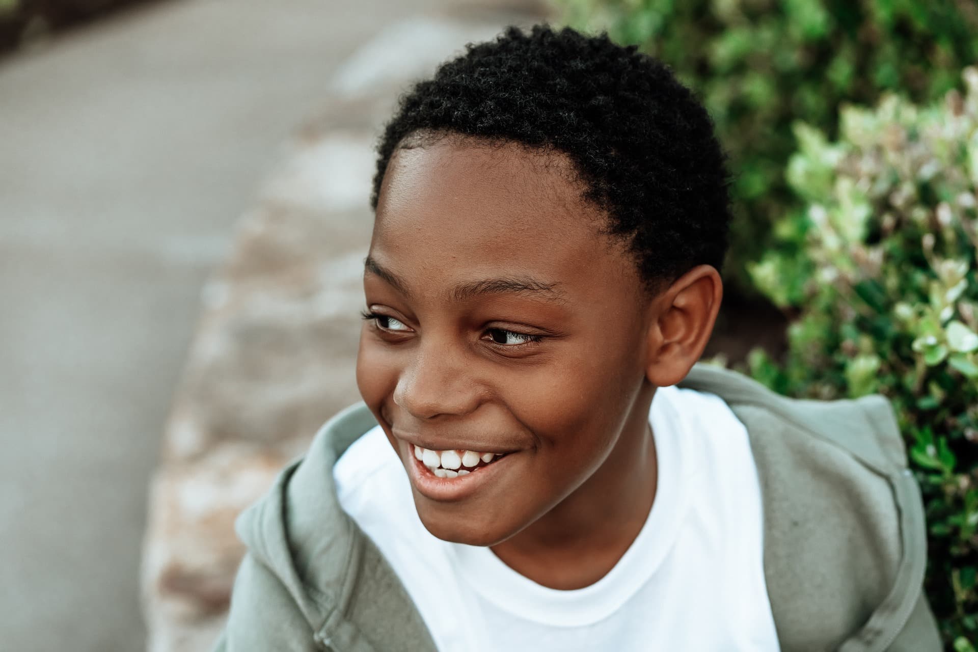 preteen boy smiling